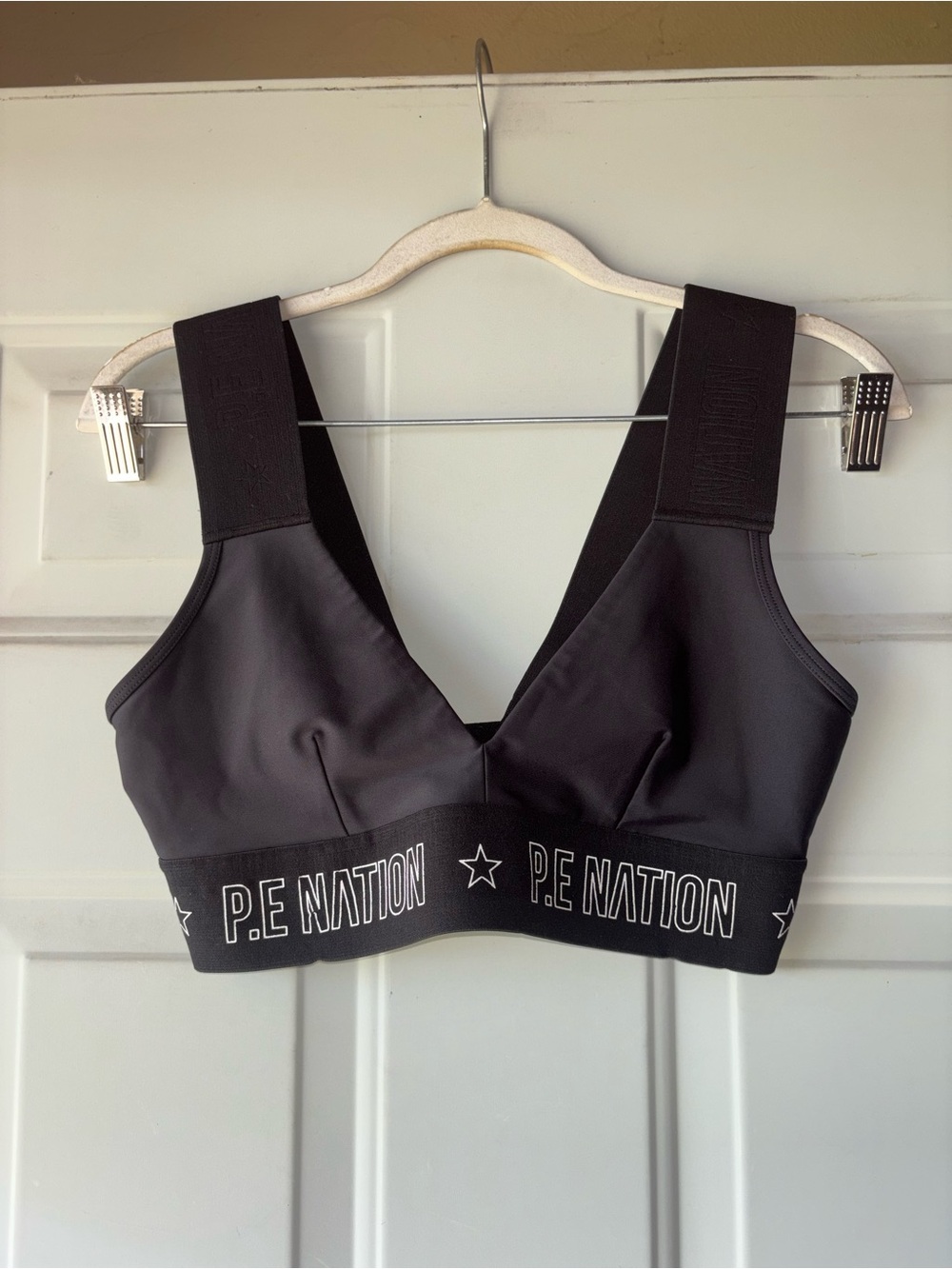 P.E. Nation black/blue Strike sports bra size S